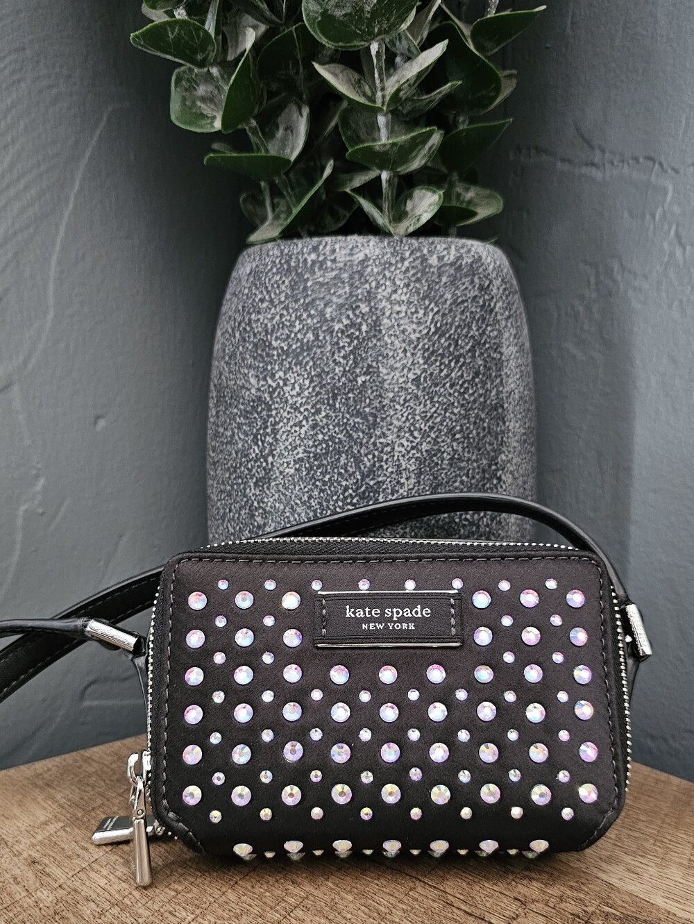 Kate Spade black crossbody with iridescent stud accents